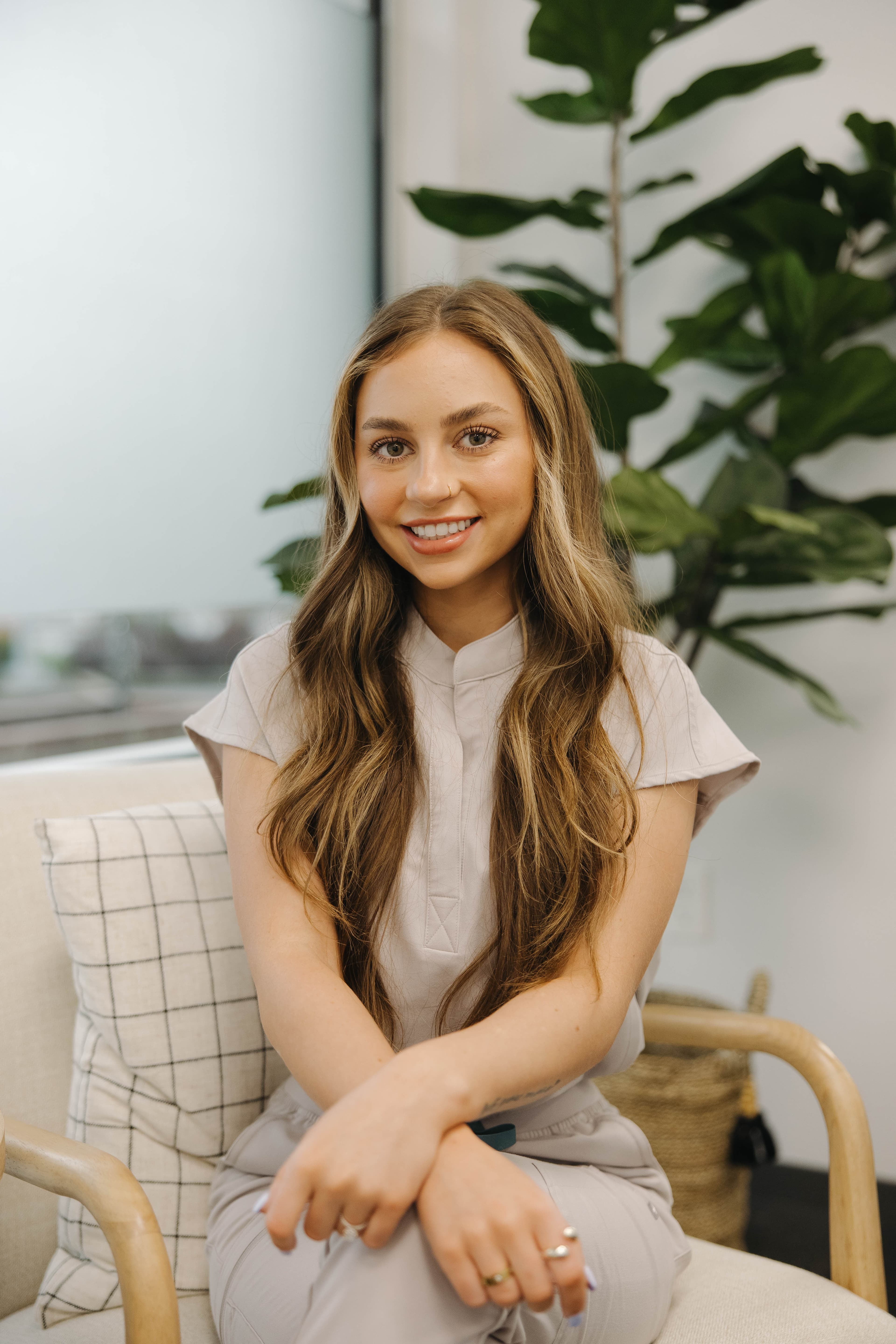 Maleah Espinoza, Aesthetic Nurse Injector at MC Aesthetics in McMinnville, in a Professional Setting Showcasing Her Passion for Natural Enhancements